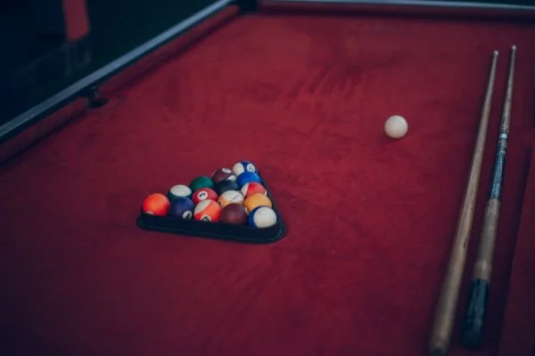 snooker balls and cue stick